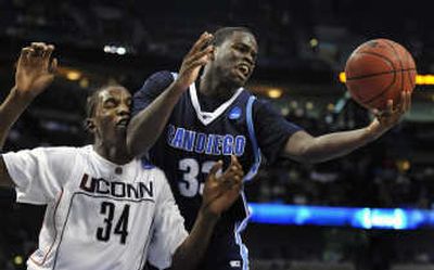 
San Diego's Clinton Houston gives Connecticut's Hasheem Thabeet an elbow in the face. Associated Press
 (Associated Press / The Spokesman-Review)