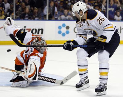 Buffalo Sabres’ Thomas Vanek scores the winning goal on Philadelphia Flyers goalie Sergei Bobrovsky in overtime. (Associated Press)