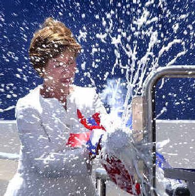 
First lady Laura Bush christens the USS Texas by breaking a bottle of American sparkling wine on the nuclear-powered attack submarine. First lady Laura Bush christens the USS Texas by breaking a bottle of American sparkling wine on the nuclear-powered attack submarine. 
 (Associated PressAssociated Press / The Spokesman-Review)