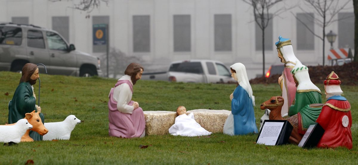 A Nativity scene of plastic figures sits on the Capitol campus Wednesday in Olympia. (Associated Press)