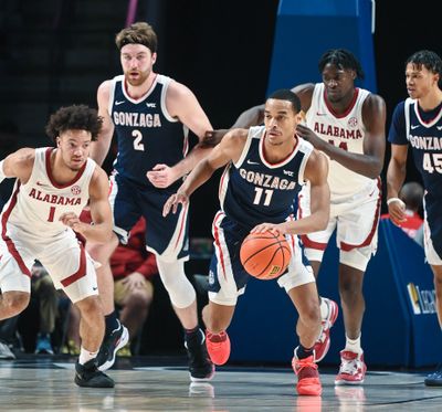 Gonzaga guard Nolan Hickman heads downcourt after making a steal in the Zags' win over Alabama on Dec. 17 in Birmingham.  (Colin Mulvany/The Spokesman-Review)