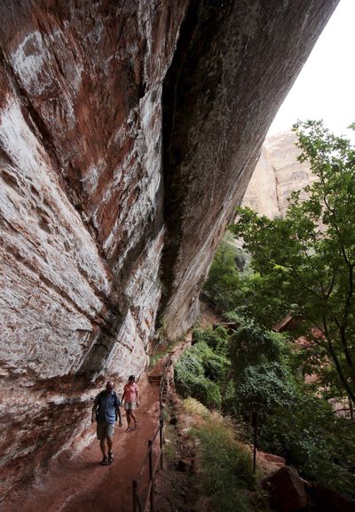 Hikers walk the Emerald Pools Trails in Zion National Park, Utah.  (Associated Press)