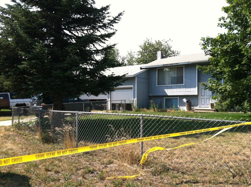 Detectives search murder suspect Daniel Arteaga's home at 19329 E. Valleyway Ave., in Spokane Valley on Tuesday. (Meghann Cuniff / The Spokesman-Review)