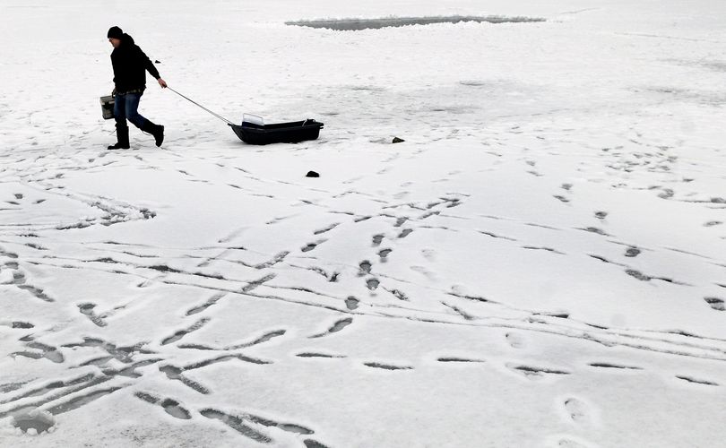 “I caught the limit,” said Tom Colnaric, of Hayden, after ice fishing at Fernan Lake in Coeur d’Alene on Monday.  (Kathy Plonka)