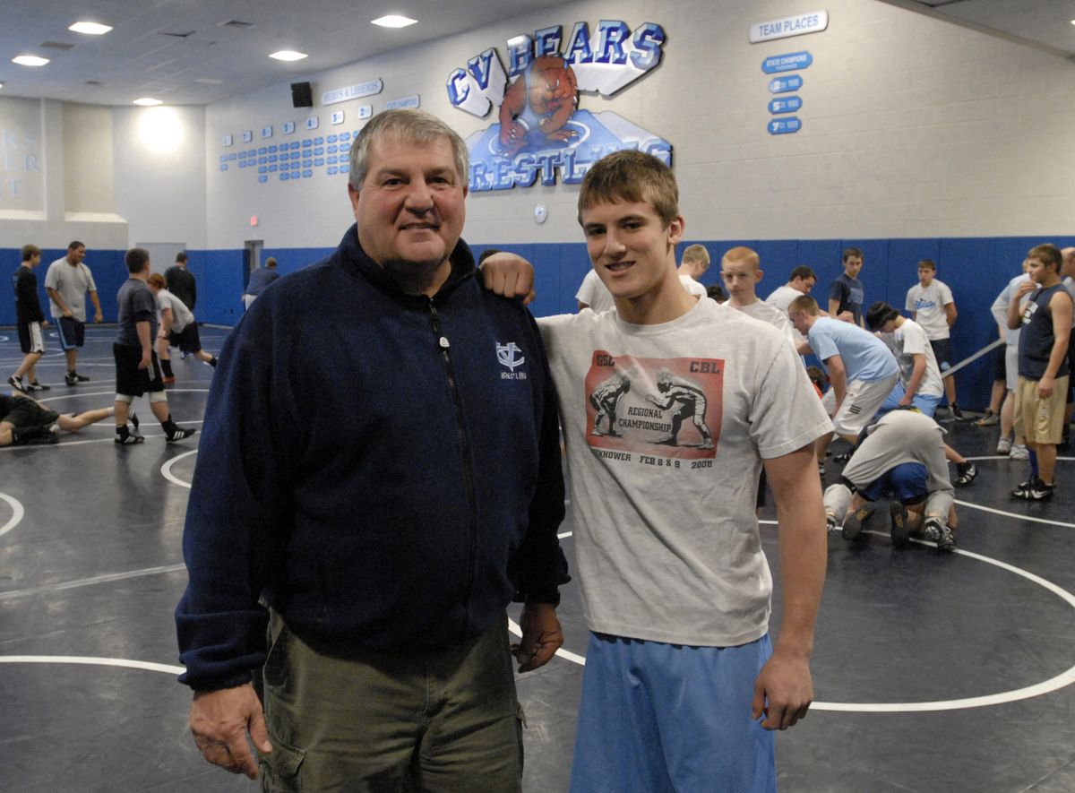 Central Valley wrestler Tyler Simmet leans on his head coach, Rick Giampietri, in more ways than one. Giampietri is also his grandfather and his head football coach. The Bears football team was  the GSL co-champion this fall. Simmet is a returning state wrestling veteran.  (J. BART RAYNIAK / The Spokesman-Review)