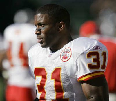 
Kansas City Chiefs running back Priest Holmes looks on from the sideline as his team plays the Oakland Raiders. Associated Press
 (Associated Press / The Spokesman-Review)