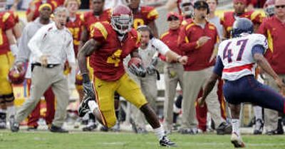 
Joe McKnight, USC play Notre Dame. Associated Press
 (Associated Press / The Spokesman-Review)