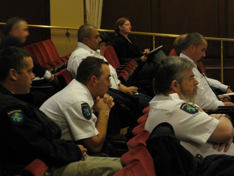 Emergency medical services providers are among those listening in the audience as the Idaho Legislature's joint legislative oversight committee hears a newly unveiled report calling for reforms in how Idaho organizes and provides its emergency medical services across the state. (Betsy Russell)