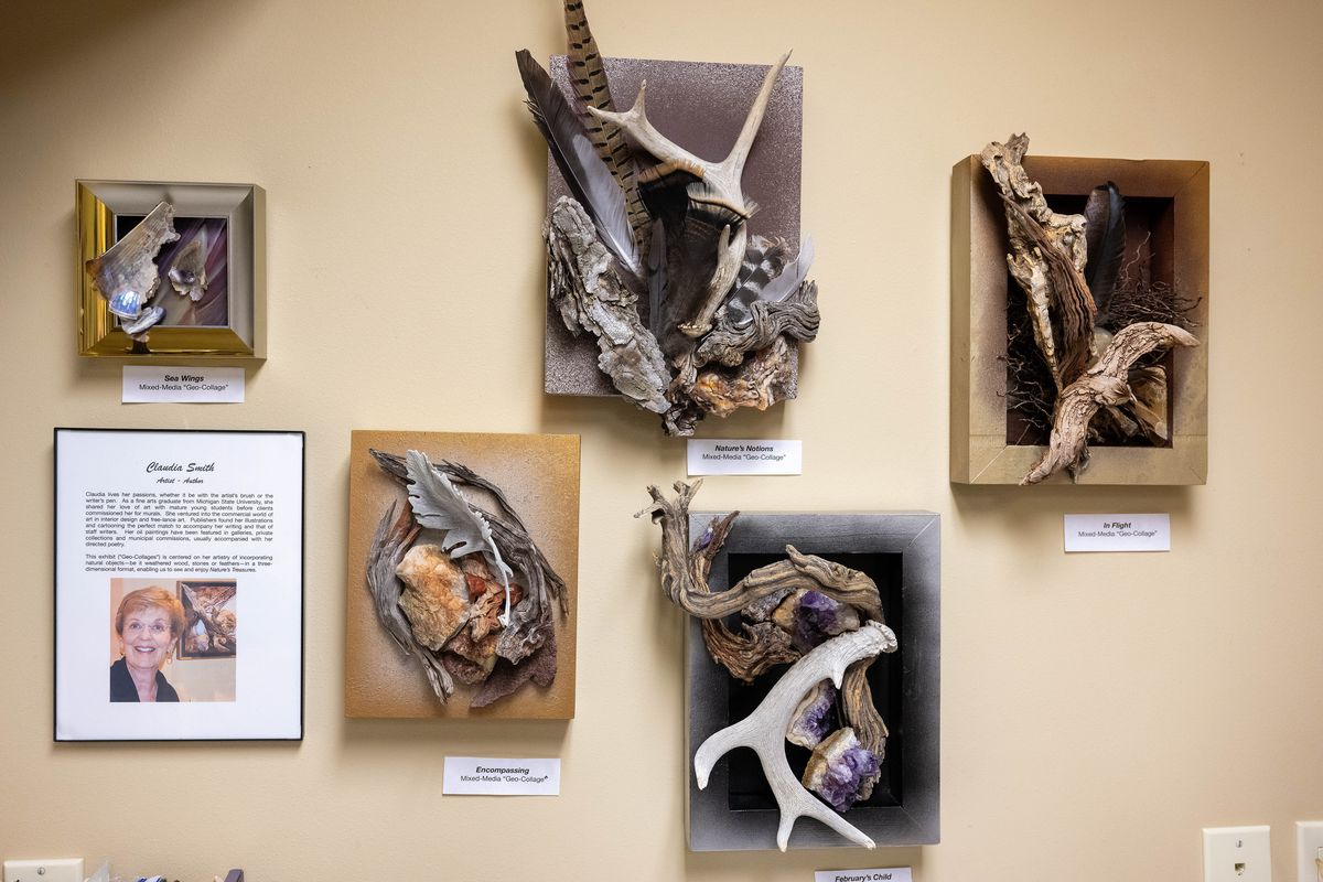 Artist Claudia Smith has many of her completed artworks on display in her south Hill basement studio. Claudia Smith collects rocks, weathered wood, feathers, fossils and odd sets of deer antlers from both Arizona, where she winters, and Washington where she summers. She turns these natural artifacts into artwork.  (COLIN MULVANY/THE SPOKESMAN-REVI)