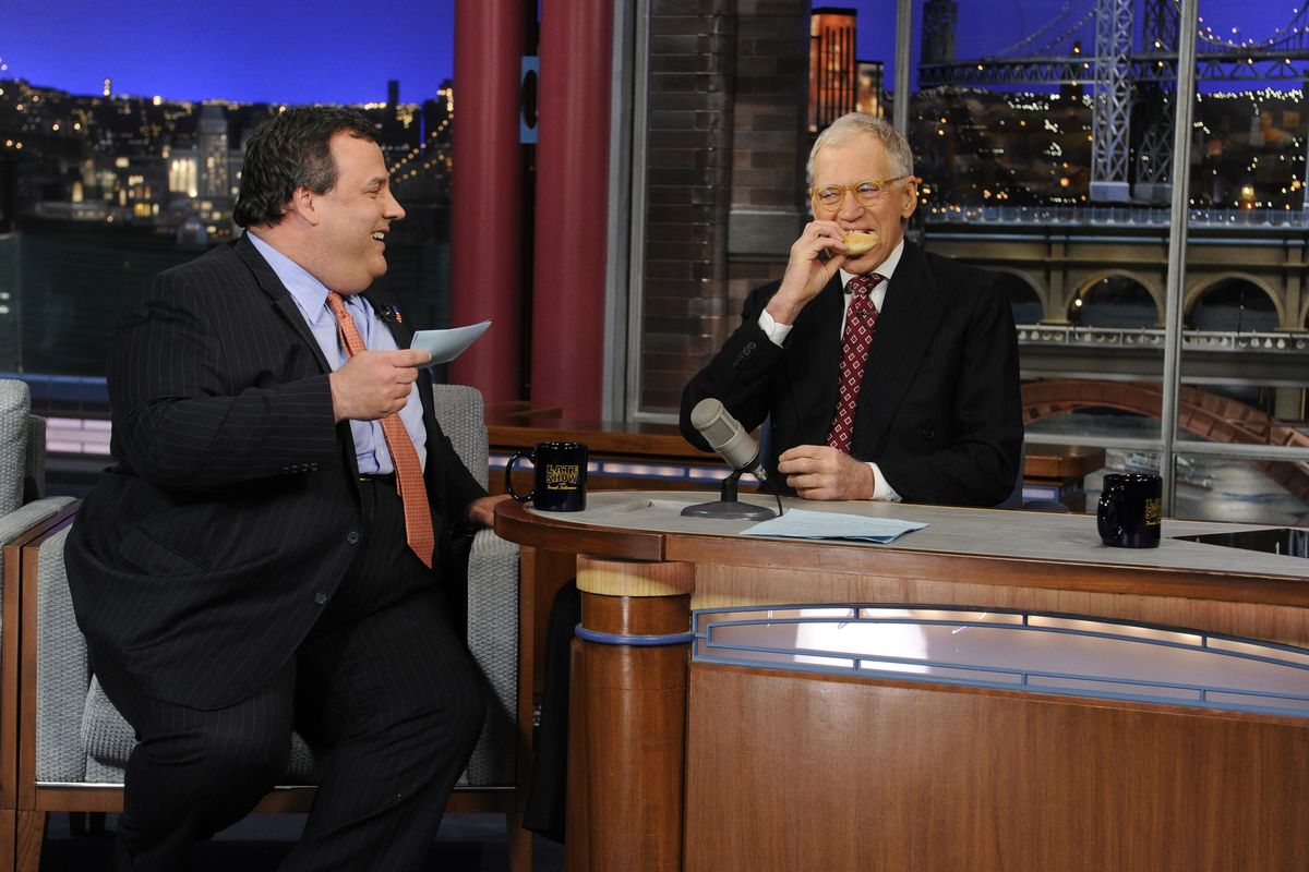 New Jersey Gov. Chris Christie chats with David Letterman during CBS’ “Late Show” on Monday. (Associated Press)
