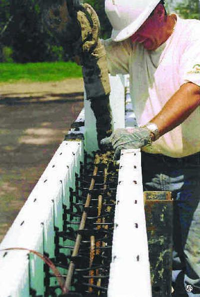 
Some builders now opt for these Nudura interlocking units (of reinforced concrete sandwiched between two layers of expanded polystyrene foam insulation) to construct better homes, schools, hospitals, condominiums, hotels, offices, and other public buildings.
 (Metro Services / The Spokesman-Review)
