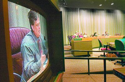 
The image of Councilman and Park Board member Bob Apple fills the monitor as he addresses the board Thursday. 
 (CHRISTOPHER ANDERSON / The Spokesman-Review)