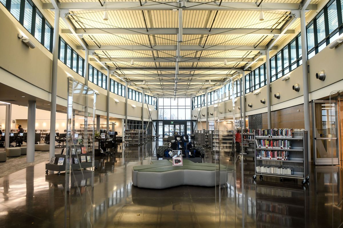 The entrance of the renovated Shadle Park Library. The Spokane library system closed its doors over the weekend after threats of violence were made over the weekend. The person behind the threats has been identified.   (Kathy Plonka/The Spokesman-Review)