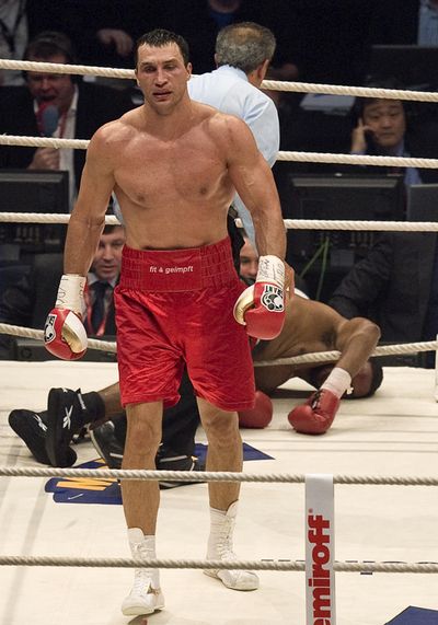 Wladimir Klitschko knocked out Eddie Chambers in Duesseldorf, Germany, to retain his WBO and IBF heavyweight belts.  (Associated Press)