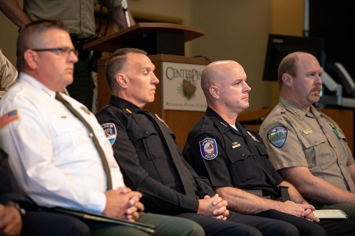From left: Adams County Sheriff Dale Wagner, Moses Lake Police Chief Kevin Fuhr, Spokane Police Chief Craig Meidl and Ferry County Sheriff Raymond Maycumber are seen during a press conference hosted and attended by nearly 20 Eastern Washington law enforcement agencies attend at CenterPlace Regional Event Center in Spokane Valley, Wash. on July 22, 2021. Representatives from the area agencies expressed concerns with some of the legislative and public safety updates that will go into effect on Sunday in Washington state.  (Libby Kamrowski/The Spokesman-Review)