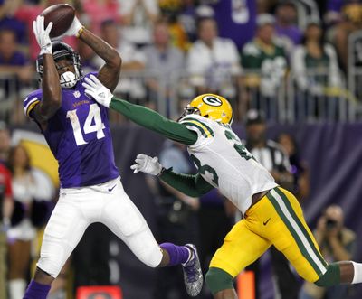 FILE - In this Sept. 18, 2016, file photo, Vikings wide receiver Stefon Diggs, left, catches a 25-yard touchdown pass over Packers cornerback Damarious Randall. Diggs returned to practice Monday after being sidelined for a knee injury. (Andy Clayton-King / Associated Press)