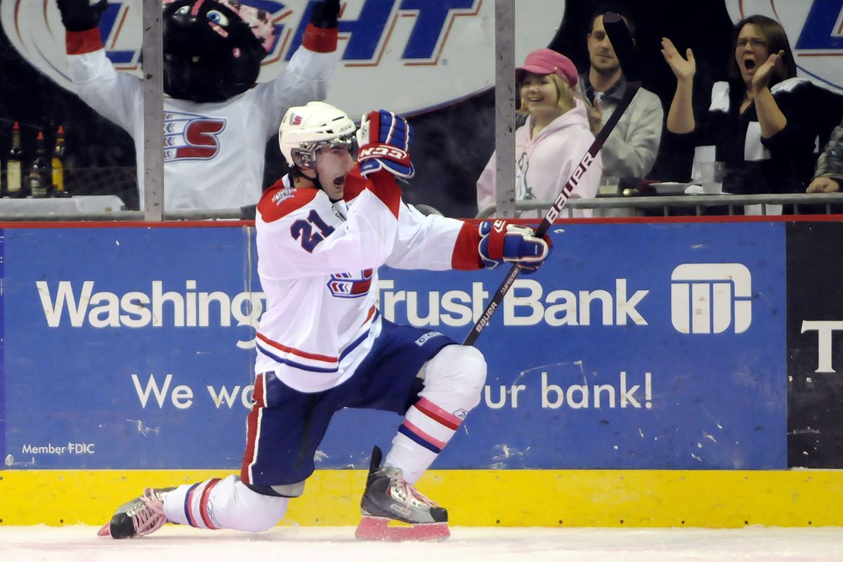 Spokane’s Kyle Beach pumps up the Arena crowd after scoring in the first period Saturday. (Jesse Tinsley)
