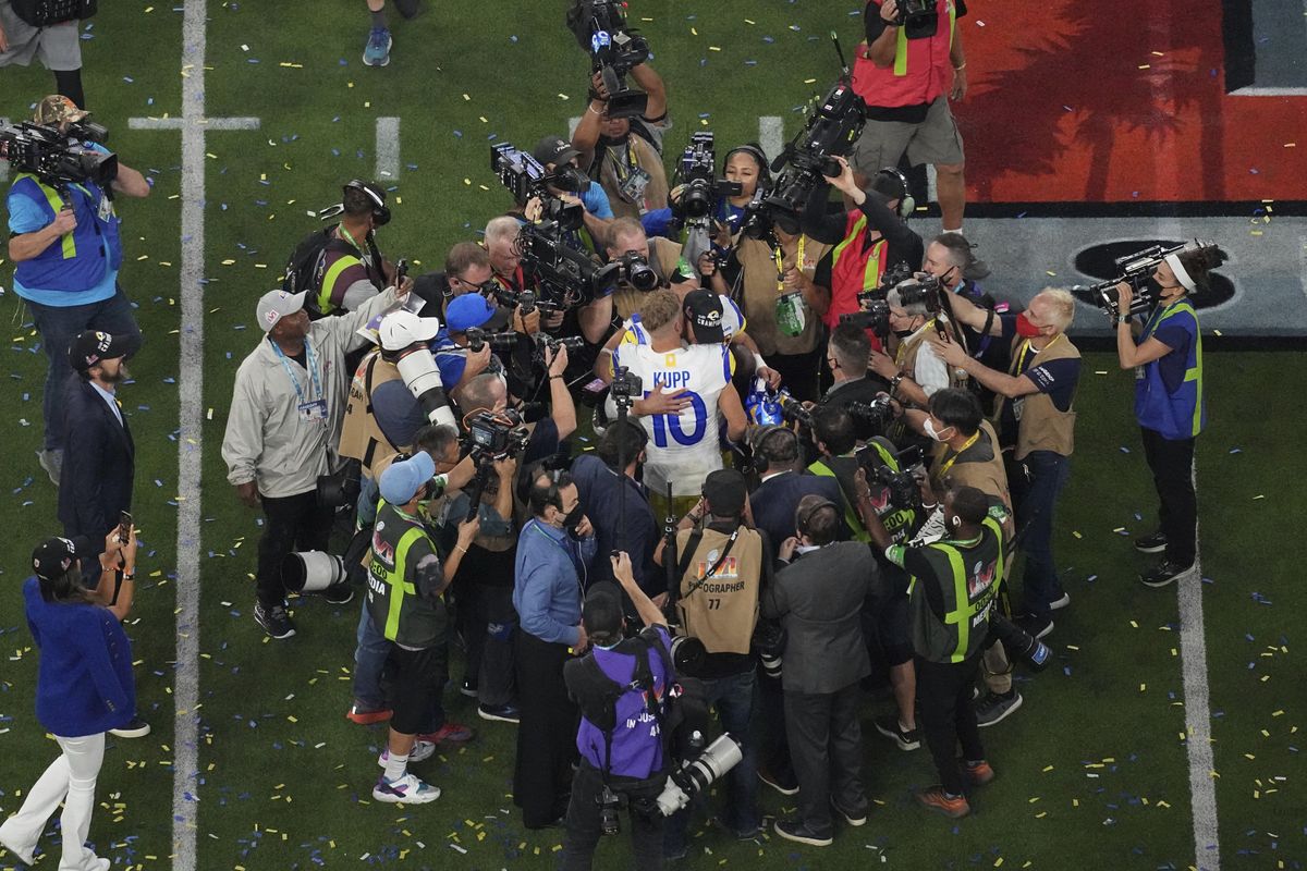 Los Angeles Rams wide receiver Cooper Kupp and quarterback Matthew Stafford hug after winning Super Bowl 56 against the Cincinnati Bengals on Sunday in Inglewood, Calif.  (Associated Press)