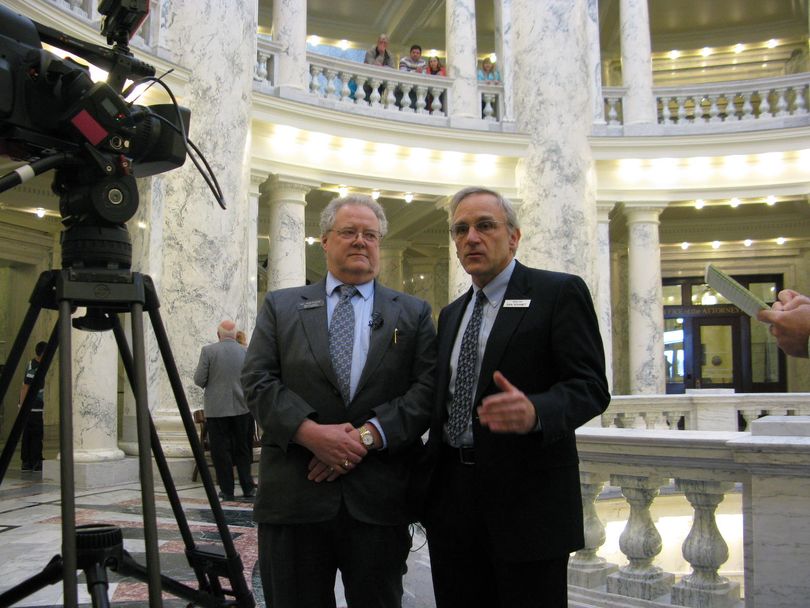 Rep. John Rusche, left, and Sen. Dan Schmidt, right, call for expansion of Medicaid in Idaho during a news conference on Tuesday in the state Capitol (Betsy Russell)