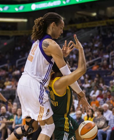 Brittney Griner knocks ball away from Seattle’s Tanisha Wright. (Associated Press)