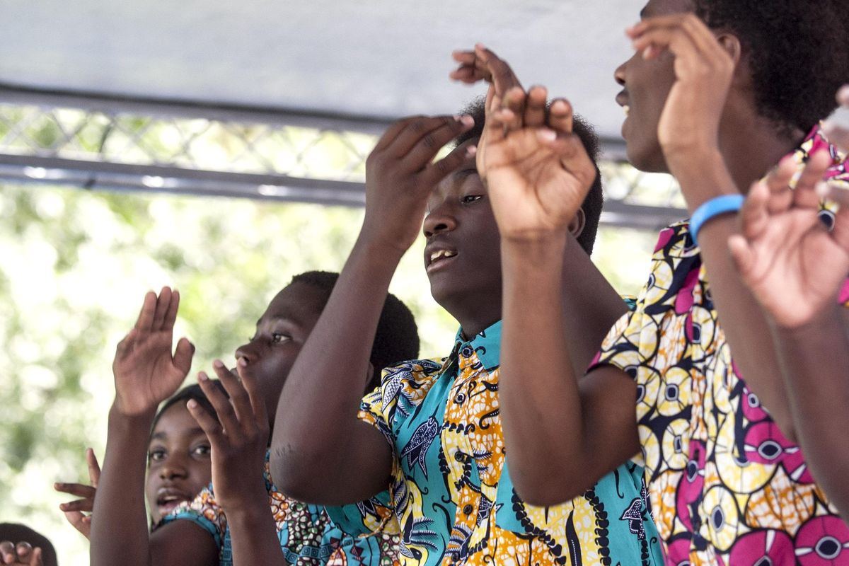 Members of Neema Youth Choir perform during the 25th Annual Unity in the Community at Riverfront Park in Spokane on Saturday, August 17, 2019. The region’s largest multi-cultural event consists of a Cultural Village, Entertainment, Career/Education Fair, Youth Area, Health Fair, Senior Resources and General Vendors. (Kathy Plonka / The Spokesman-Review)