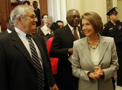 Rep. Barney Frank, D-Mass., left, and Speaker Nancy Pelosi relax after the House vote on Friday.  (Associated Press / The Spokesman-Review)