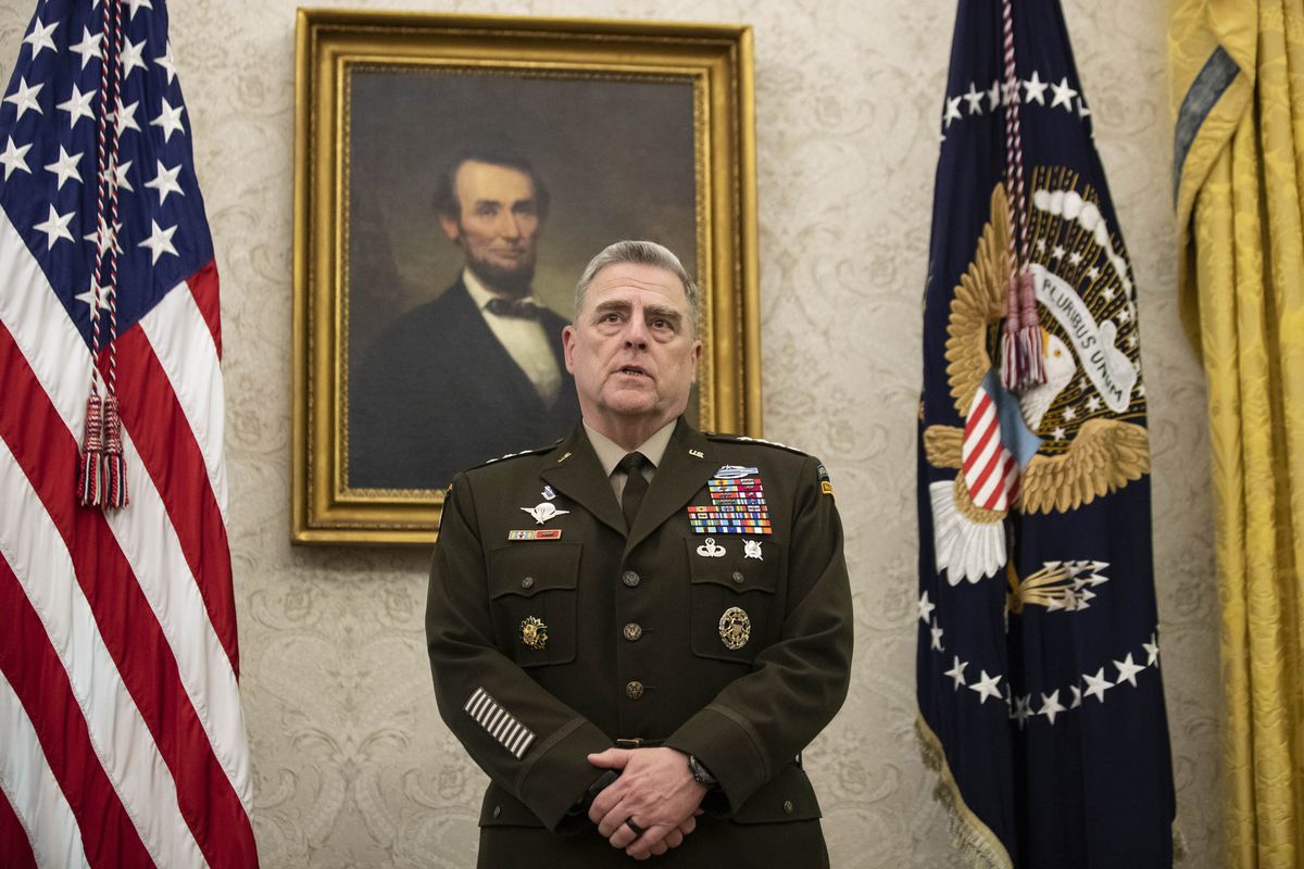 FILE - In this May 15, 2020 file photo, Joint Chiefs Chairman Gen. Mark Milley speaks during the presentation of the Space Force Flag in the Oval Office of the White House with President Donald Trump, in Washington. The top U.S. general held unannounced talks with Taliban peace negotiators in the Persian Gulf to urge a reduction in violence across Afghanistan, even as senior American officials in Kabul warned that stepped-up Taliban attacks endanger the militant group