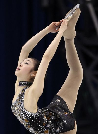 South Korean figure skater Kim Yu-Na leads after the women’s short program. (Associated Press)