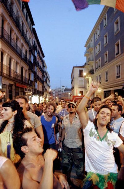 
People celebrate Spain's legalization of gay marriage during a party in Madrid. 
 (Associated Press / The Spokesman-Review)
