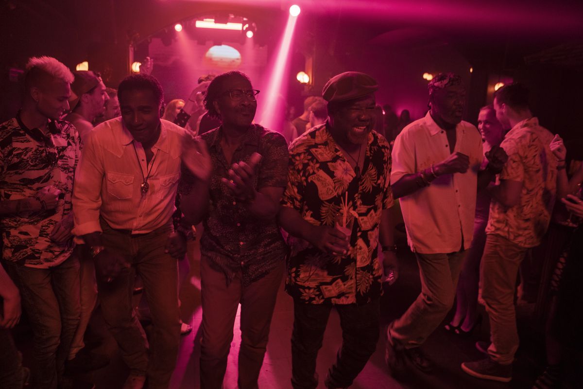 This image released by Netflix shows, from second left, Norm Lewis, Clarke Peters Isiah Whitlock Jr., and Delroy Lindo in a scene from "Da 5 Bloods," named one of the top 10 films of the year by The American Film Institute.  (David Lee)