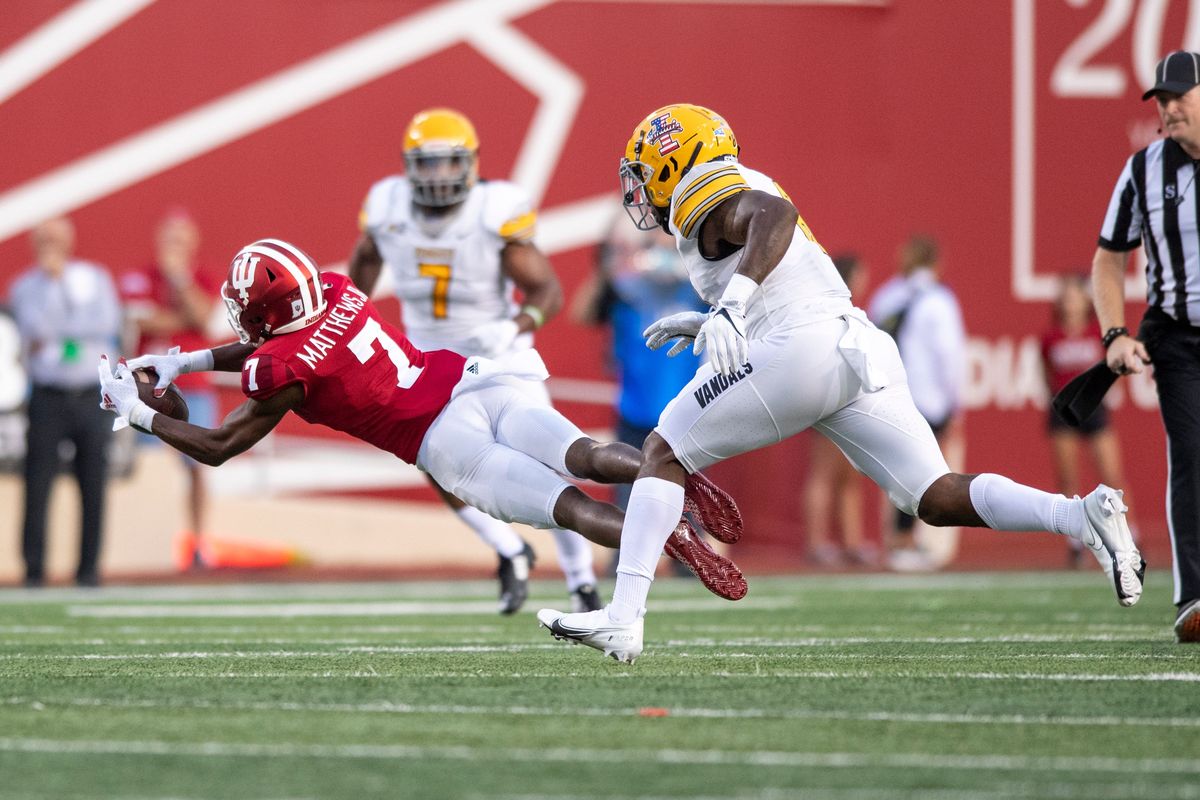 Indiana wide receiver D.J. Matthews Jr. (7) attempts a pass reception while being covered by Idaho linebacker Tre Walker (8) during an NCAA college football game, Saturday, Sept. 11, 2021, in Bloomington, Ind.   (Associated Press)