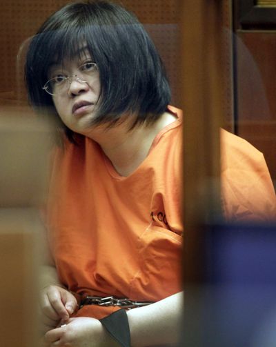 In this 2012 file photo, Dr. Hsiu-Ying “Lisa” Tseng sits in a Los Angeles courtroom during her arraignment. (Nick Ut / Associated Press)