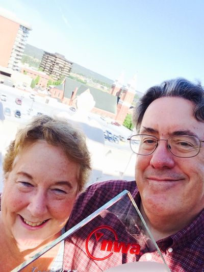 Jeri is holding an award she received from the airline after 23 years of excellent work.