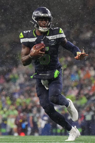 Seattle Seahawks QB Jalen Milroe carries the ball against the Kansas City Chiefs on Aug. 15 at Lumen Field in Seattle.  (Getty Images)