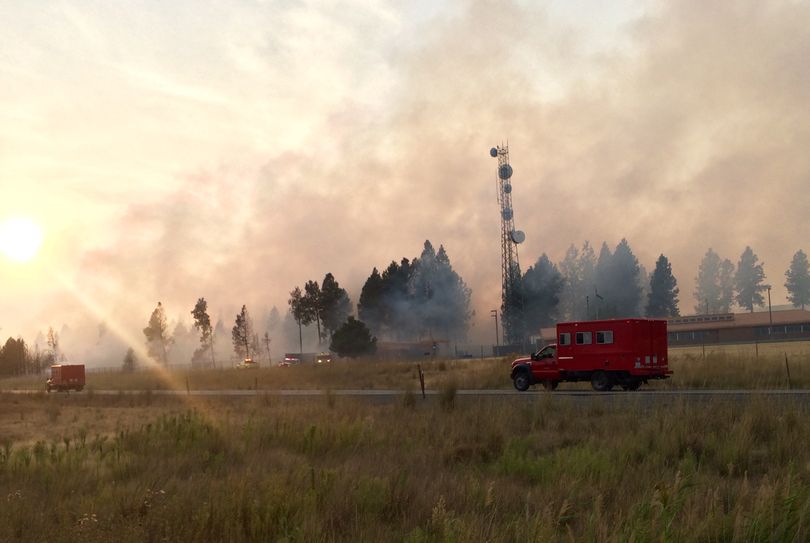 A fire erupted near Interstate 90 west of Spokane on Thursday, Aug. 27 near the Geiger exit. (Colin Mulvany)