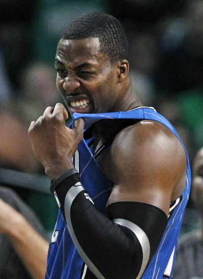 Dwight Howard is the centerpiece of a four-team trade, agreed to in principle Thursday, that will send the star center to the Lakers. (Associated Press)