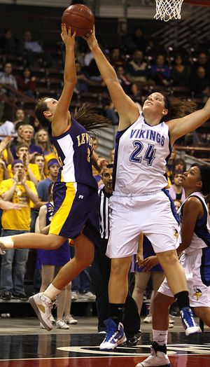 Coeur d'Alene's Carli Rosenthal (24) blocks the shot of Lewiston's Tanis Fuller, left, in the 5A Girls State Championship basketball game on Saturday, Feb. 20, 2010, in Nampa, Idaho.  Coeur d'Alene won 51-45. (Matt Cilley / Fr117486 Ap)