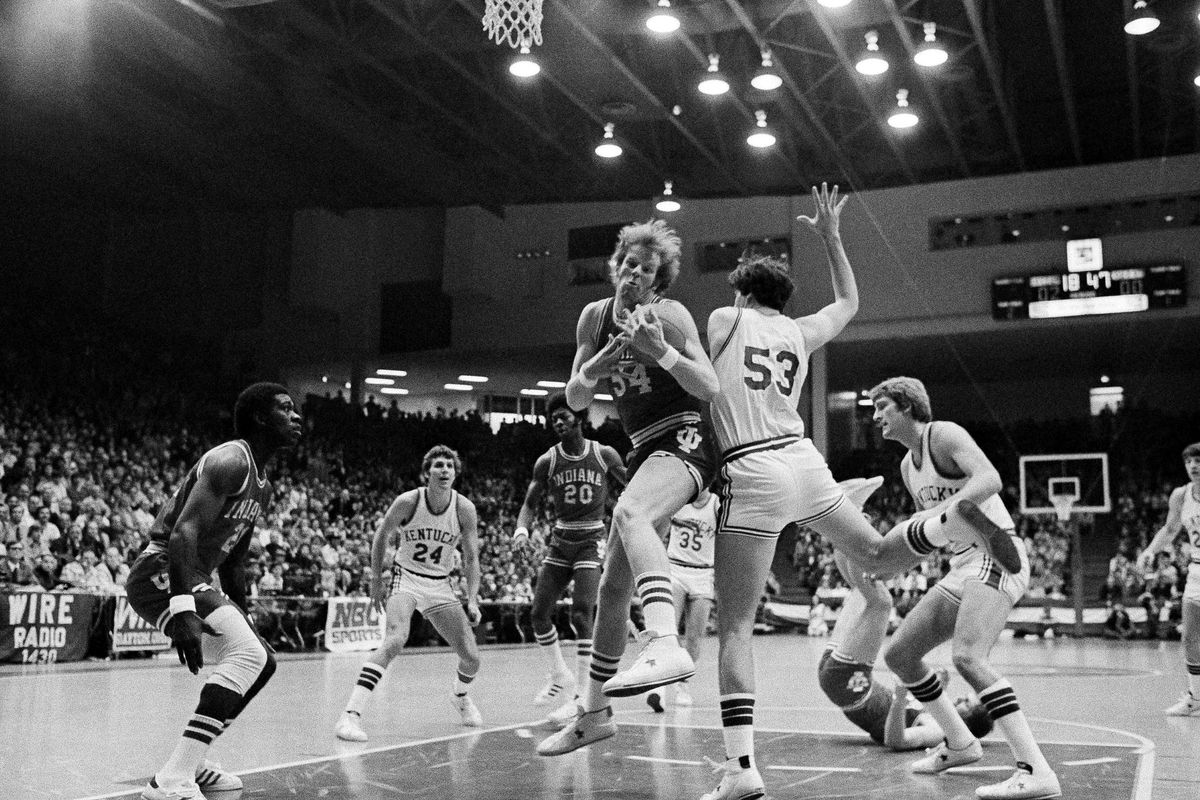 Indiana’s Kent Benson, left center, takes a rebound away from Kentucky’s Rick Robey during a 1975 NCAA Tournament Mideast Regional final showdown in Dayton, Ohio.  (Associated Press)