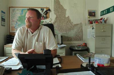 
Rand Wichman, shown in his office Friday, has worked for Kootenai County for 15 years. He is resigning as director of the planning and building department to go into land-use consulting. 
 (Jesse Tinsley / The Spokesman-Review)