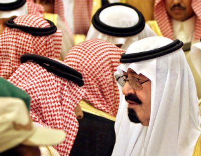 
Saudi King Abdullah, right, receives the oath of loyalty from a tribal chief Wednesday in Riyadh.
 (Associated Press / The Spokesman-Review)