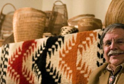 
Don Barlow collects baskets, made by the Yukor Tribe.
 (The Spokesman-Review)