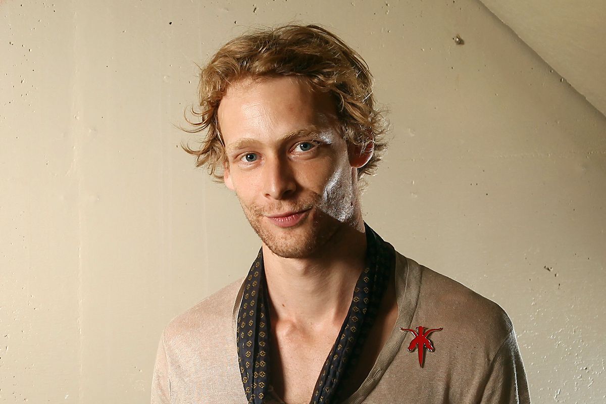 FILE - This Sept. 14, 2011 file photo shows actor Johnny Lewis posing for a portrait during the 36th Toronto International Film Festival in Toronto, Canada. Authorities say Lewis fell to his death after killing an elderly Los Angeles woman. Lewis appeared in the FX television show "Sons of Anarchy," for two seasons. The woman killed is identified as 81-year-old Catherine Davis. (Carlo Allegri / R-allegri)