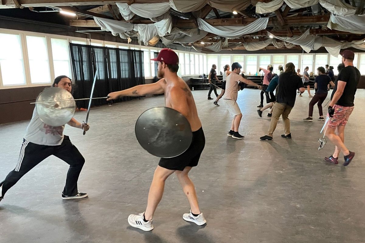 Performers practice swordplay backstage before a showing of "The Lost Colony" on Roanoke Island, N.C., on July 24, 2023. MUST CREDIT: Washington Post photo by Gregory S. Schneider.  (Gregory S. Schneider/The Washington Post)