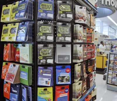 Consumers would be wise to read the fine print before purchasing any gift card. (Associated Press / The Spokesman-Review)