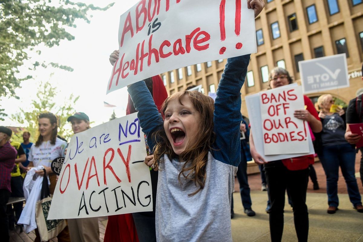 Eight-year-old SadieBelle Adams yells during the Planned Parenthood abortion rights rally in front of the Federal Courthouse in Spokane on Tuesday, May 3, 2022.  (Kathy Plonka)