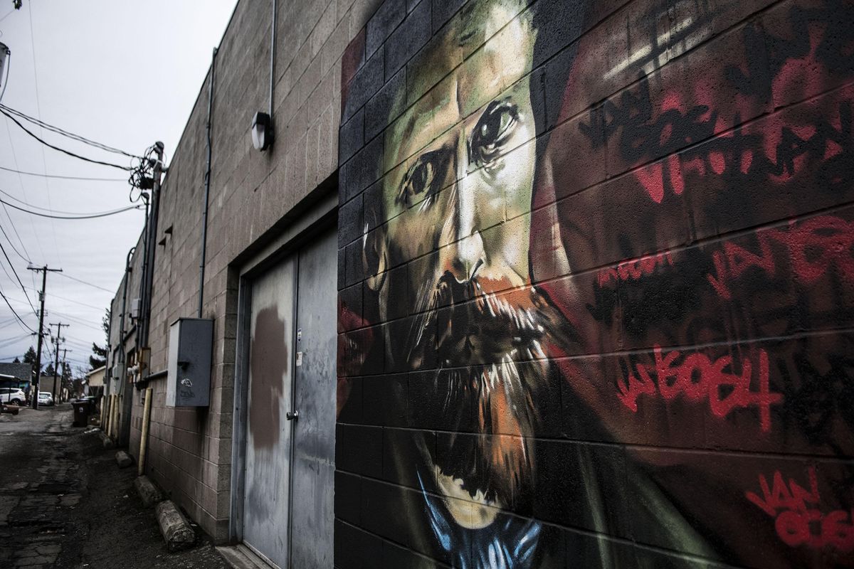 This mural of Vincent Van Gogh, by spray-paint artist Daniel Lopez, is the first mural in the collection in “mural alley” to the south between Post and Monroe in the Garland District in Spokane. It is photographed on Thursday, Feb. 1, 2018. (Kathy Plonka / The Spokesman-Review)
