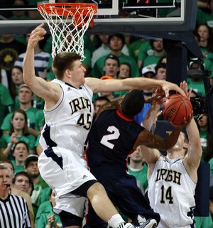 GU’s Marquise Carter has his shot blocked by the Irish’s Jack Cooley. (Associated Press)