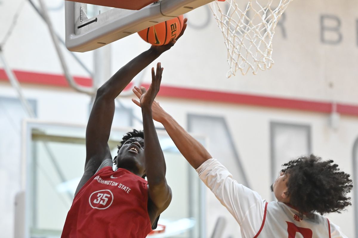 Washington State expects a big season from forward Mouhamed Gueye, here driving to the hoop during a recent practice in Pullman.  (Tyler Tjomsland/The Spokesman-Review)