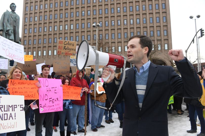 FILE – Andrew Biviano, chairman of the Spokane County Democratic Party, speaks to a large crowd in downtown Spokane in protest of President Donald Trump’s travel ban on Jan. 29, 2017. (Jesse Tinsley / The Spokesman-Review)