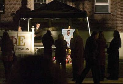 
Mourners of Jerid  Sturman-Camyn gather outside the Sigma Phi Epsilon fraternity Monday in Cheney to hold a vigil. Sturman-Camyn died Saturday after being dragged behind a pickup.
 (CHRISTOPHER ANDERSON / The Spokesman-Review)